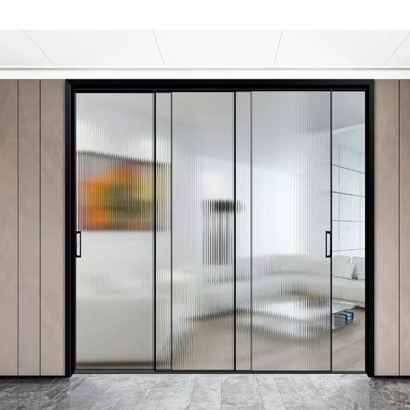 Des portes coulissantes en aluminium de design moderne avec une épaisseur de paroi de 1,4 mm et un double verre